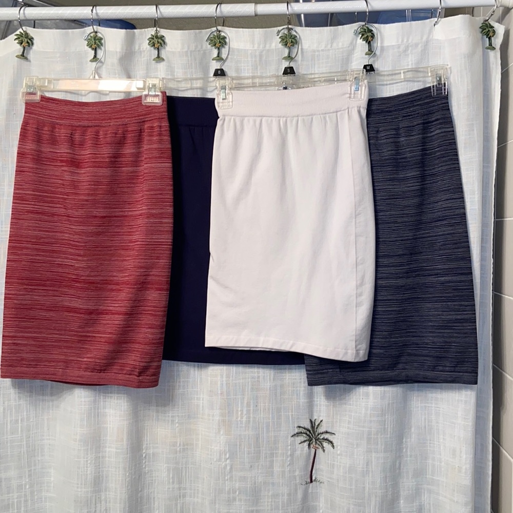 Lot of never before worn stretchy midi skirts